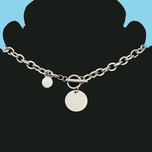 Detail of silver OT clasp chain necklace with dual polished round disc pendants