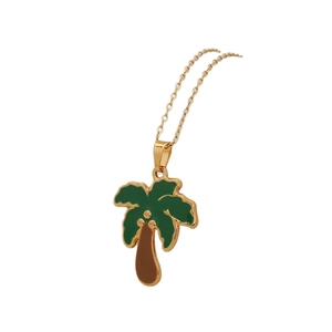 Gold stainless steel necklace featuring a tropical palm tree pendant with green enamel detail