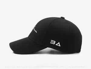 Side view of black cotton baseball cap showing white line embroidery and BA letter logo