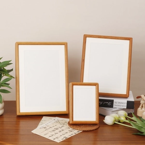 Three-piece solid wood photo frame set with natural grain and white mats for home decor