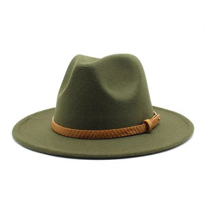 Detail of olive green wool fedora hat featuring a brown braided faux leather band