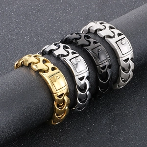 Close-up of punk style stainless steel keel chain bracelets in four metallic finishes