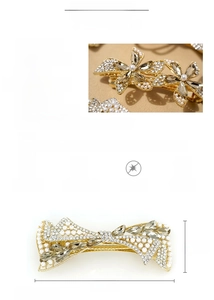 Detail view of crystal and pearl bow spring hair clip in gold finish with 8.3cm dimensions