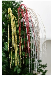 Close-up of sparkling 90cm glitter sequin fringe branch on a green Christmas tree