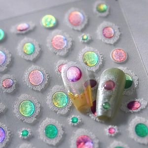Iridescent 3D nail stickers with white lace borders and holographic finish on nails