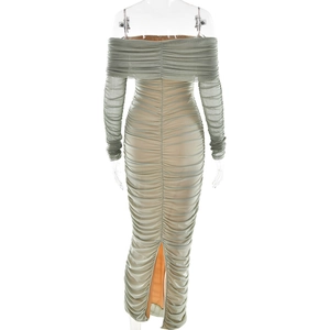 Detail view of the mesh dress back with elegant ruched texture and slit hem in sage green