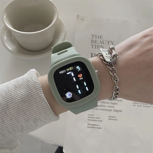 Detail of green square digital watch on wrist with a minimalist lifestyle background