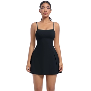 Detailed view of the slim shoulder straps and high-stretch fabric on the black tennis dress