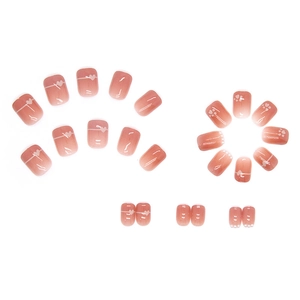 Square press-on nails with nude pink gradient, white hearts, and cat paw patterns