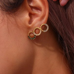 Gold twist hoop earrings with green gemstone, pearl, and zircon accents for women