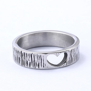 Minimalist silver stainless steel heart ring with unique bark texture and cutout design