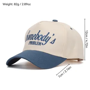 Two-tone baseball cap in beige and blue with Somebody's PROBLEM embroidery and sizing