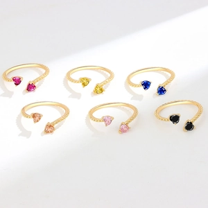 Adjustable golden beaded open ring set with dual heart-shaped birthstone zircons