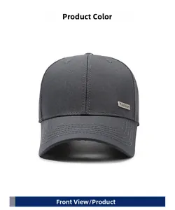 Detail of dark grey baseball cap featuring fine texture and silver metal Fashion logo tag