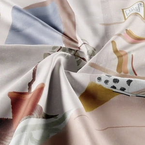Detail of silk scarf with abstract vase and botanical pattern in soft morandi colors