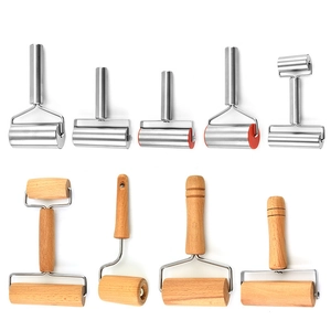 Set of stainless steel and beech wood rolling pins for professional baking and dough rolling