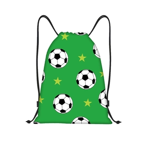 Detail of green polyester drawstring bag with football and star prints and black ropes