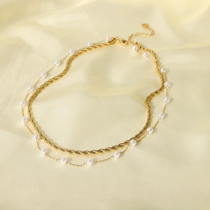 Double-layer 18K gold stainless steel chain necklace with white pearls on beige silk