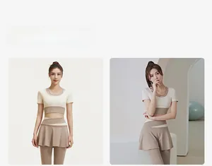 Detail view of high-waist yoga set with criss-cross waistband and beige crop top