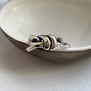 Minimalist 925 sterling silver knotted ring with vintage finish and geometric design
