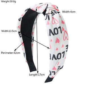 Knotted fabric headband with heart print and LOVE lettering for Valentine's hair accessory