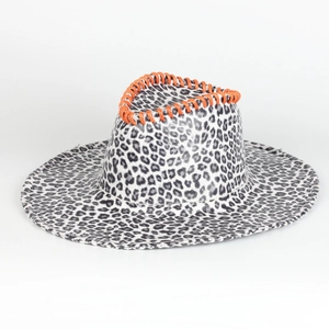 Close-up of leopard print cowboy hat with orange braided rope trim and soft texture
