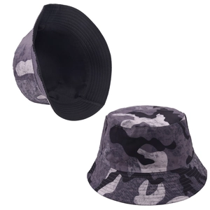 Detail view of the ink-wash print bucket hat showing the interior black lining and fabric