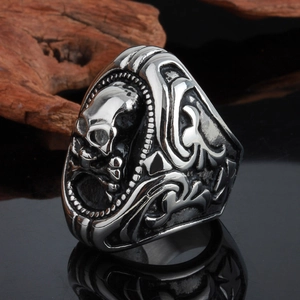 Vintage punk skull ring for men with shield-shaped embossed head and antique silver finish