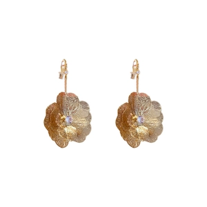Elegant gold flower drop earrings with zircon center and textured metal petals