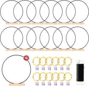 DIY floral hoop set with 12 black metal rings, wooden bases, and warm LED fairy lights
