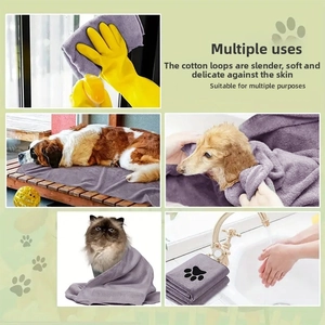Macro detail of purple microfiber pet towel showing paw prints and multiple usage scenarios