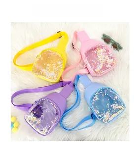 Close-up of four candy-colored transparent PVC mini chest bags with glitter sequins