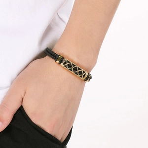 Men's double braided leather bracelet with golden hollow patterned magnetic clasp