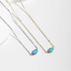 Minimalist S925 silver turquoise necklace in gold and silver finish on white background