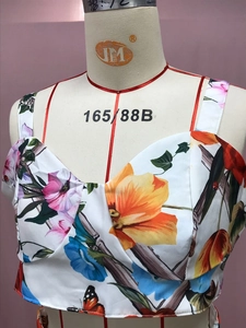 Detail view of the floral print sleeveless crop top with ruched bust and thin straps