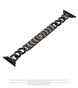 Detailed view of black metal denim chain watch strap with elegant large link chain design