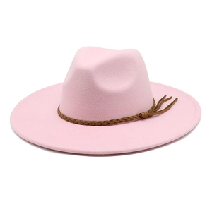 Detail of pink wool fedora hat featuring a brown braided leather band and side tassel