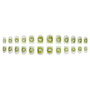 Short round press-on nails set with green gradient design and white heart patterns