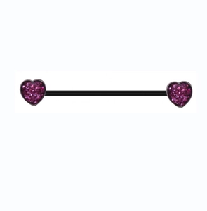 Macro detail of industrial barbell with purple glitter heart ends and black coated steel bar