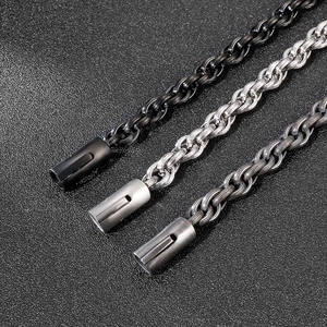 Detail of punk style titanium steel chains in black, silver, and gunmetal gray finishes