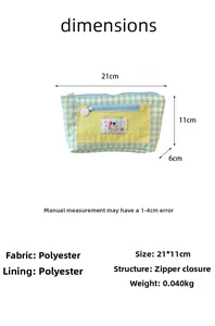 Detail view of plaid pencil case dimensions 21x11x6cm with color contrast design