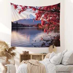 Detail of Bohemian tapestry featuring Mount Fuji and cherry blossoms in bedroom decor