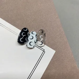 Cute Japanese moon nail stickers in black, white and clear designs with adhesive backing