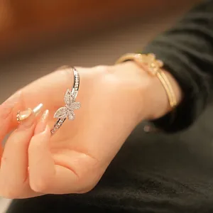 Elegant gold plated butterfly open bangle with sparkling cubic zirconia for women