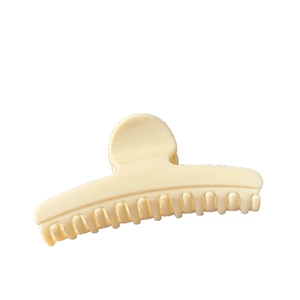 Elegant 11.5cm cream butterfly hair claw clip with round head design on white background