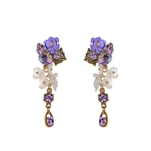 Elegant purple crystal and rose flower drop earrings with a vintage golden finish