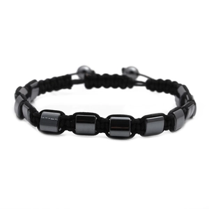 Detail of hand-woven adjustable cord bracelet with square hematite stone beads