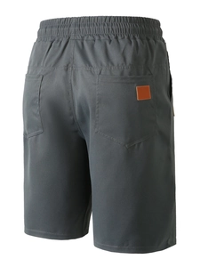 Detail of dark grey casual shorts featuring elastic waistband and double rear pockets