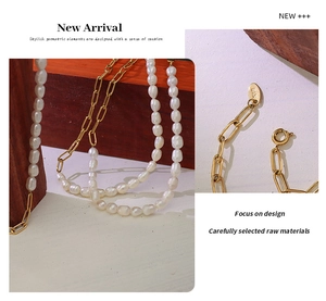 Detail of freshwater pearl and 18K gold plated clip chain necklace with K18 tag