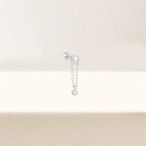 Detail of s925 silver chain stud earring with sparkling crystals and ball back screw